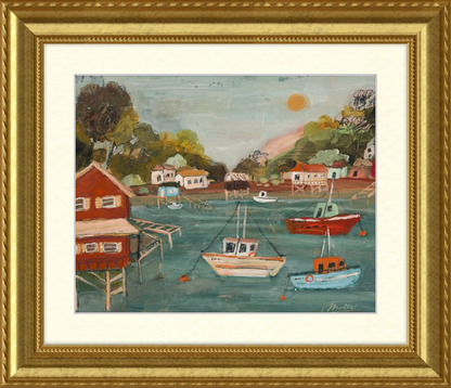 Framed painting of a coastal scene with boats and houses.