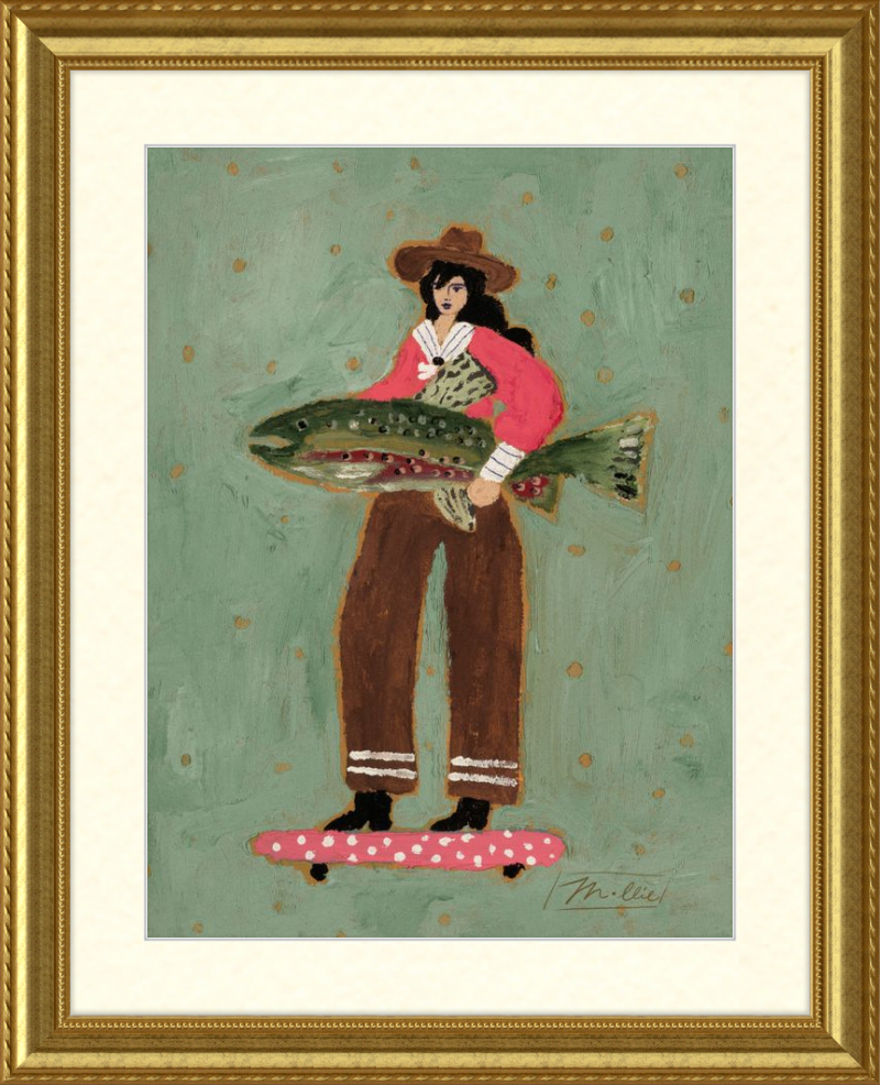 Framed artwork of a woman holding a large fish on a polka dot surfboard against a green background.